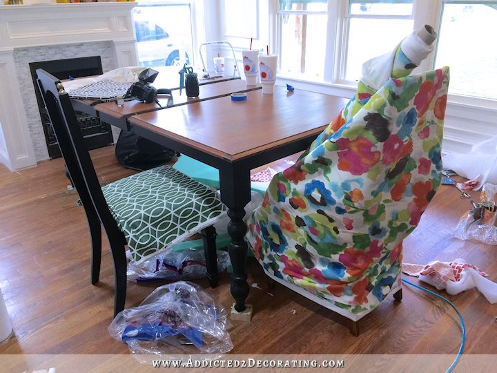 dining room fail - black chair with green and white fabric, floral watercolor fabric