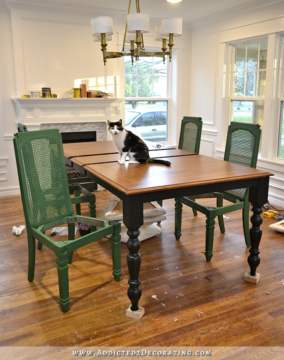 dining table and chairs progress - black farmhouse table with green cane back chairs
