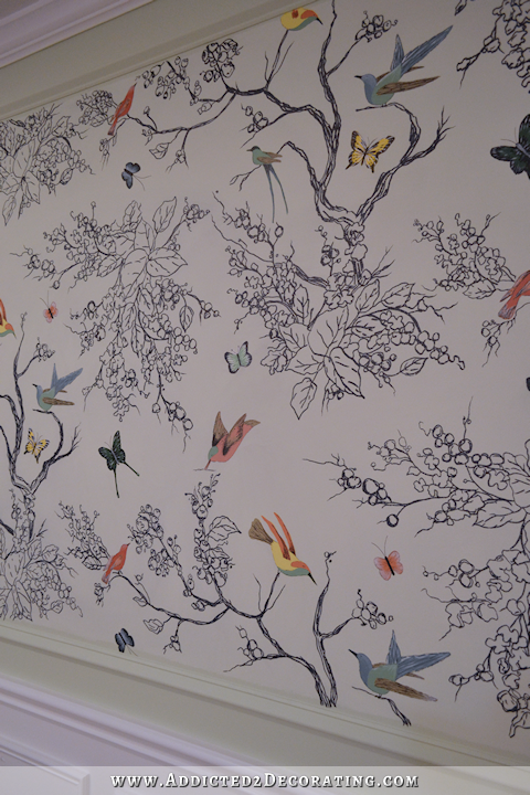 hand drawn bird and butterfly wall mural in entryway - 4