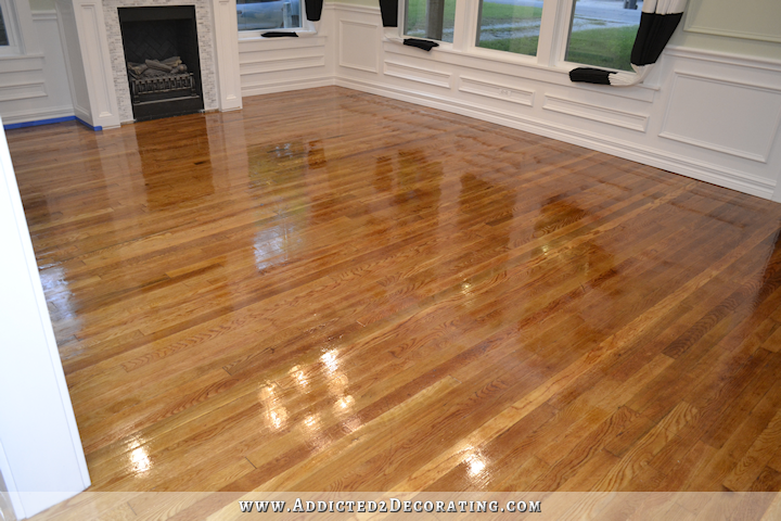 hardwood flooring with paint overspray and spills - refinishing with new coats of Waterlox - 2
