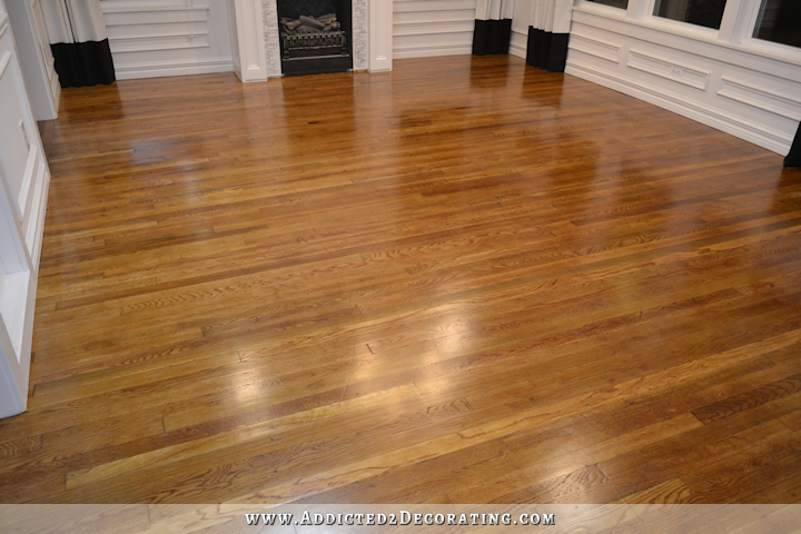 hardwood flooring with paint overspray and spills - refinishing with new coats of Waterlox - 5