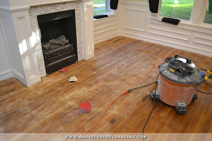 hardwood flooring with paint overspray and spills - sanding with 80-grit sandpaper - 4