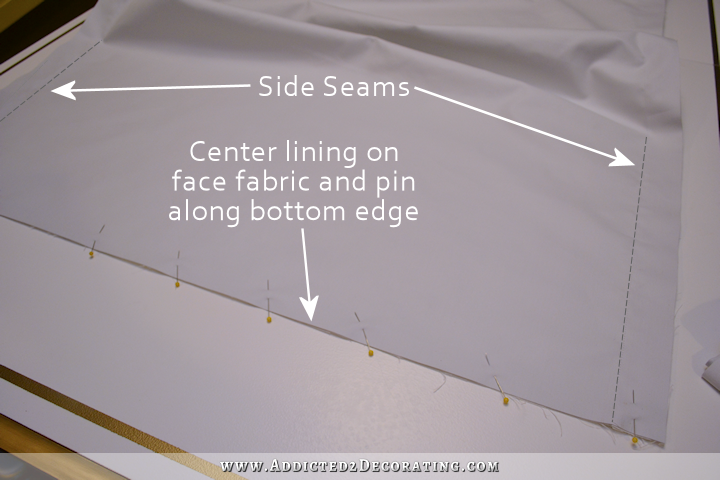 how to make Roman shades - 2 - center lining on face fabric, pin and sew along bottom edge