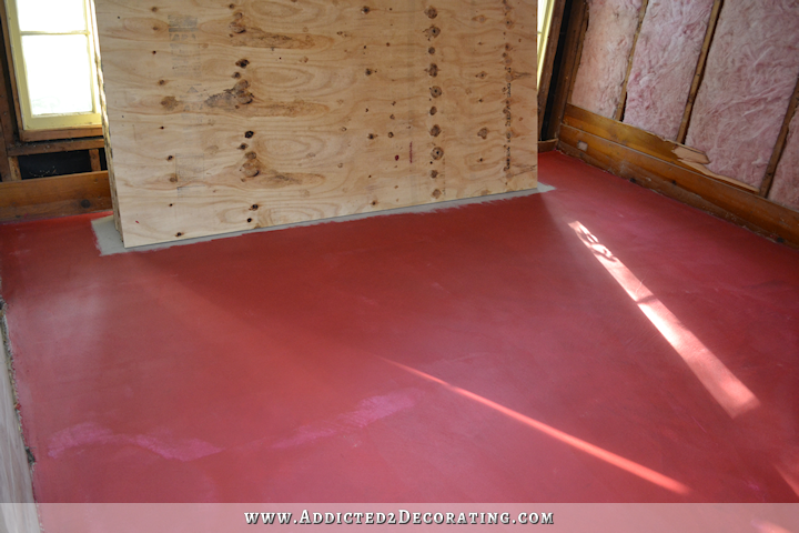 Breakfast room subfloor - moisture barrier on concete slab using RedGard - roll on using three-eights-inch nap roller - 2