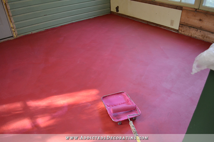 Breakfast room subfloor - moisture barrier on concete slab using RedGard - roll on using three-eights-inch nap roller