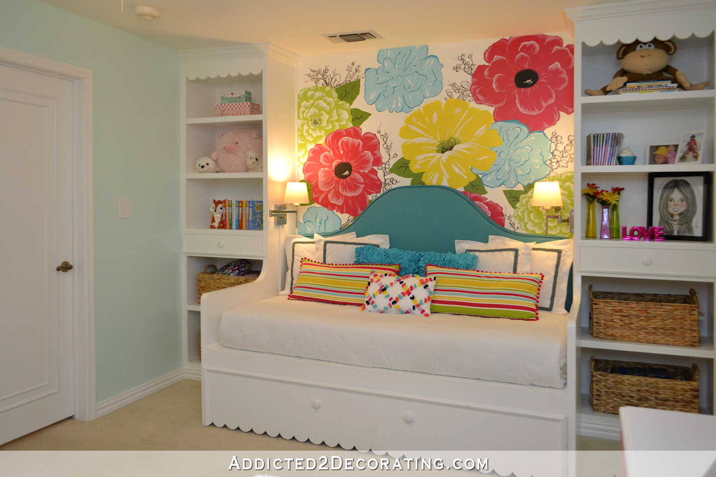 Yaleana's Bedroom - after 1 - built-in day bed flanked with built-in bookcases and large flower painted wall mural
