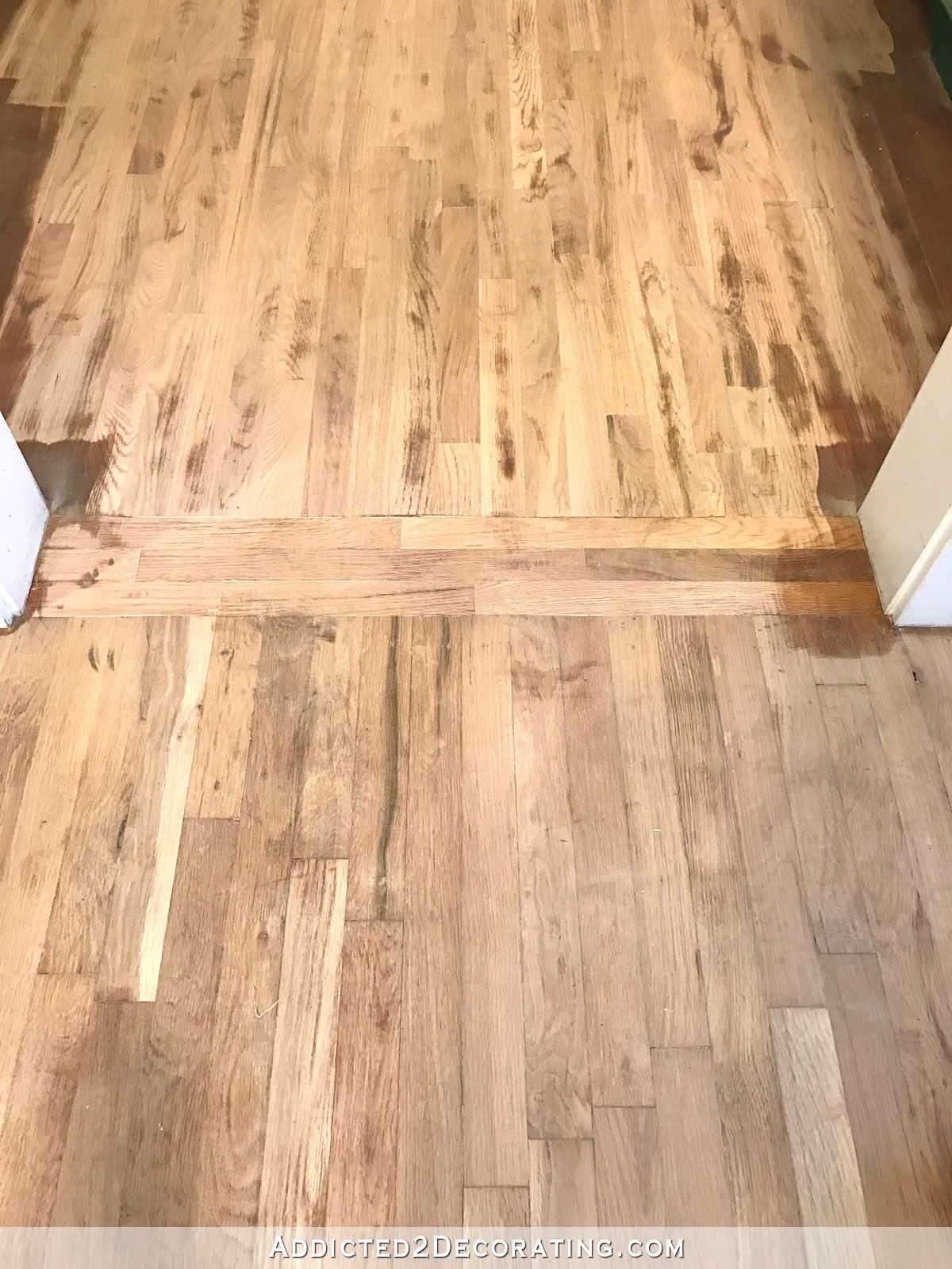 red oak hardwood floors sanded before staining - living room to kitchen