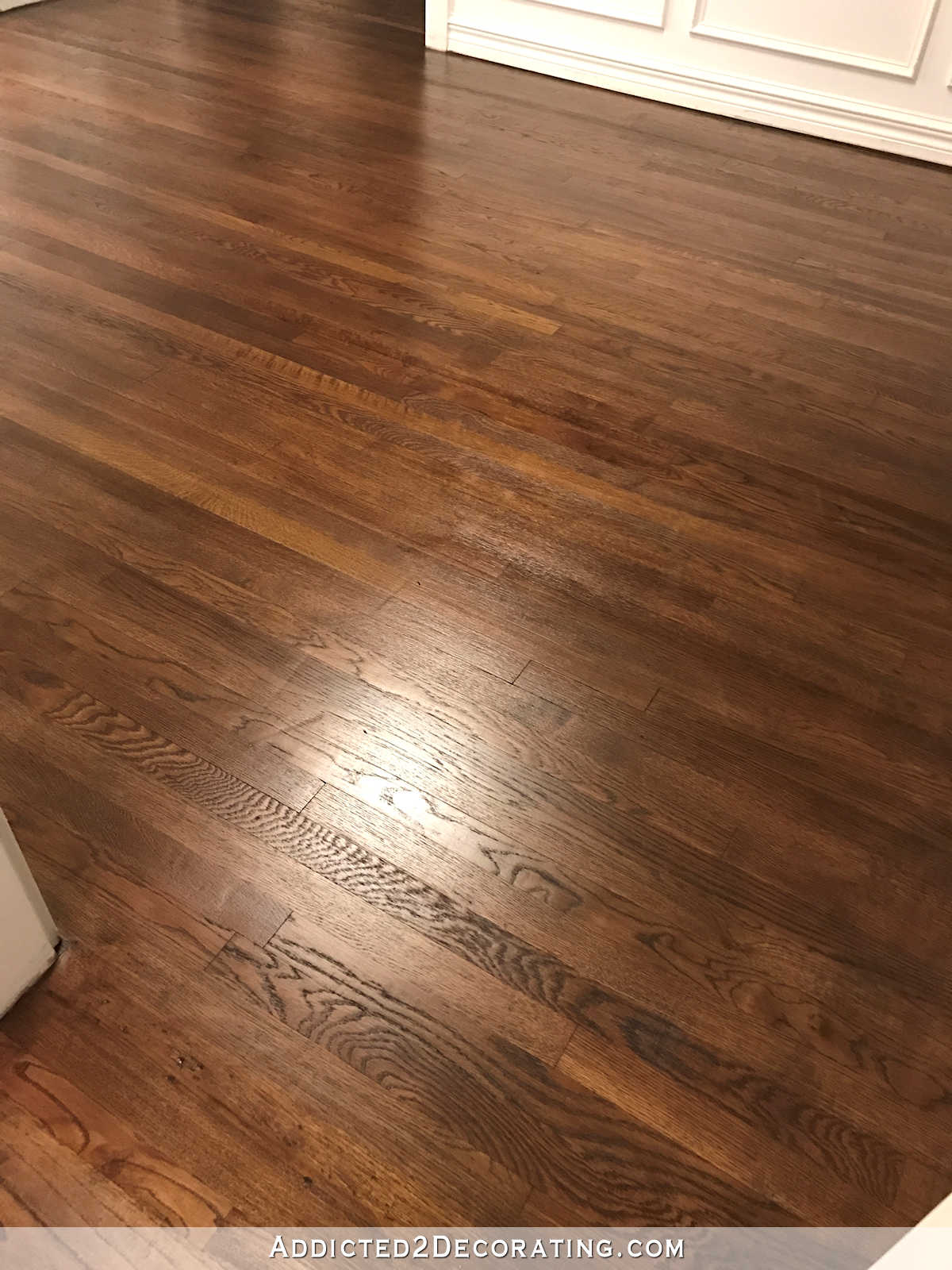 refinishing red oak hardwood floors - adding stain to first coat of polyurethane to darken the color - music room