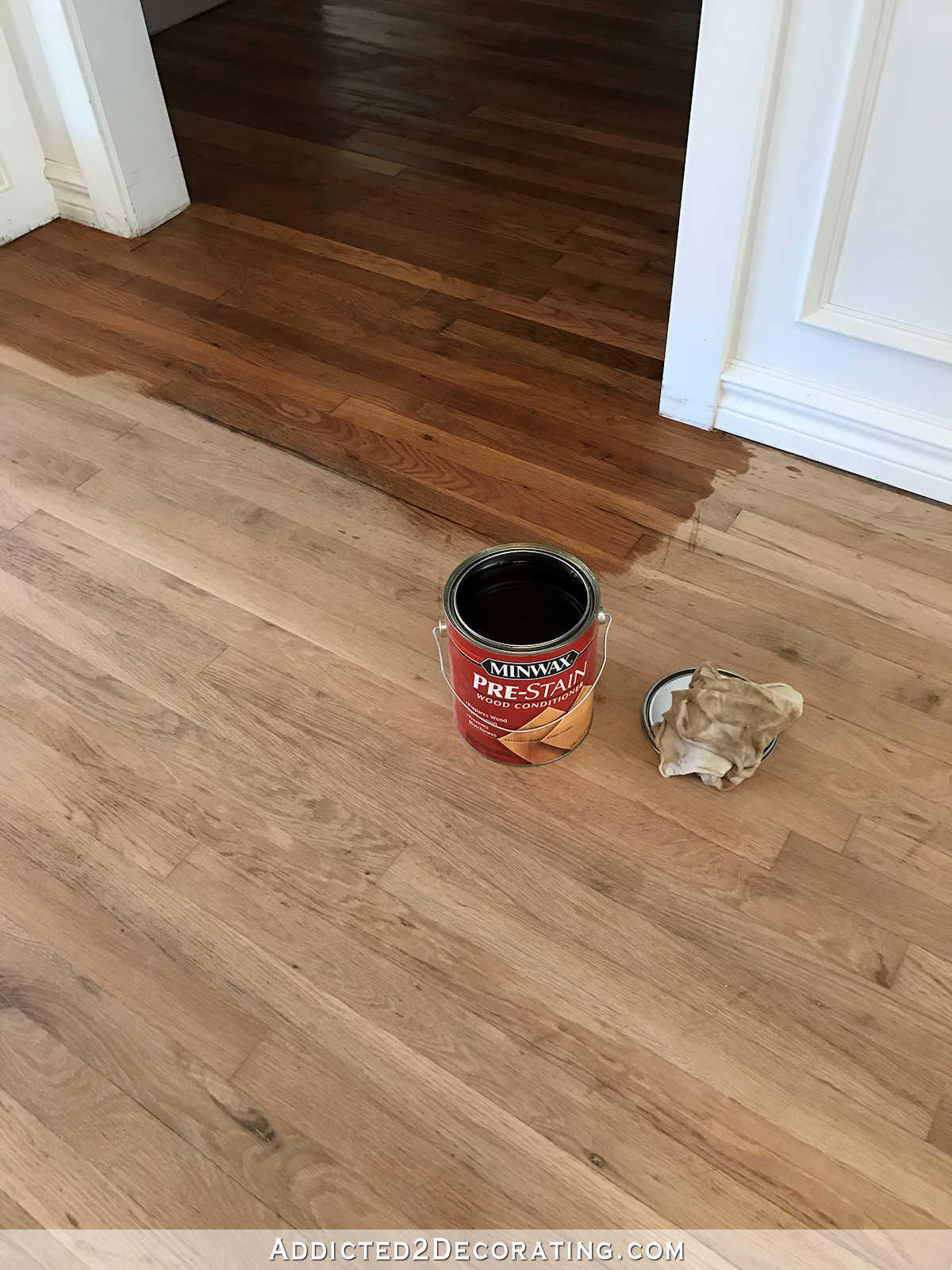 staining red oak hardwood floors - 1 - conditioning the wood with Minwax pre-stain conditioner