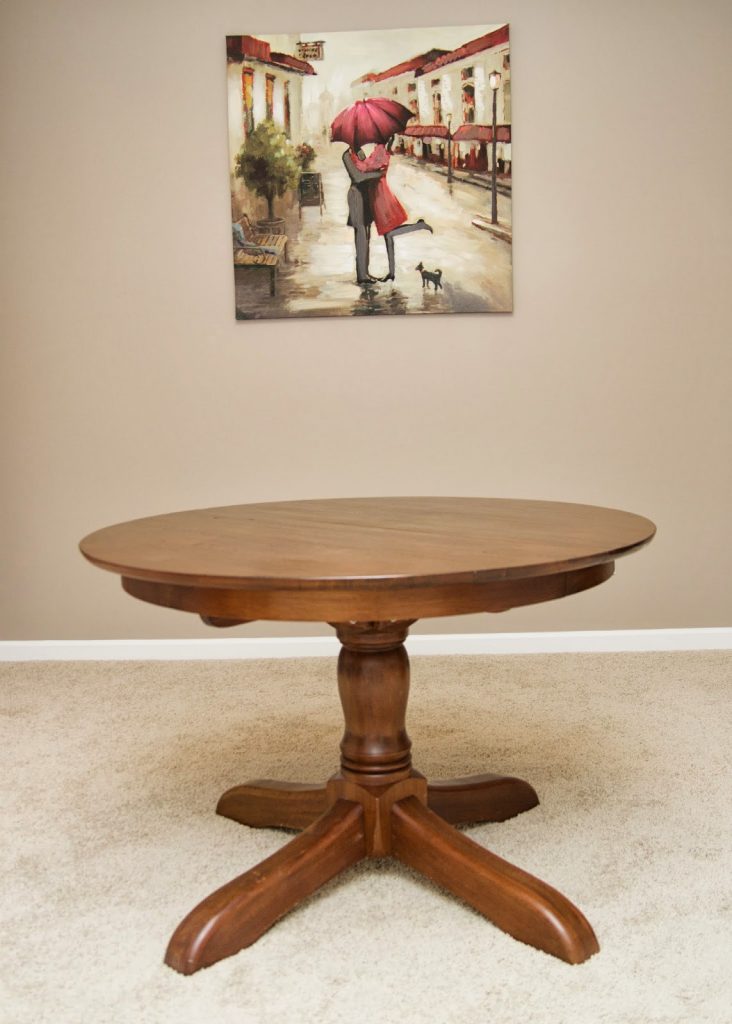 dining table makeover from Bless'er house - table before with heavy, dark stained finish