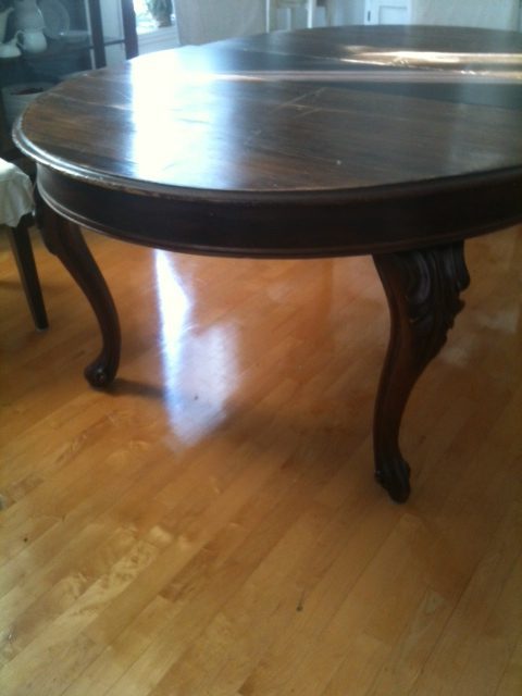 dining table makeover from Orphans With Makeup - table before with heavy dark stained finish