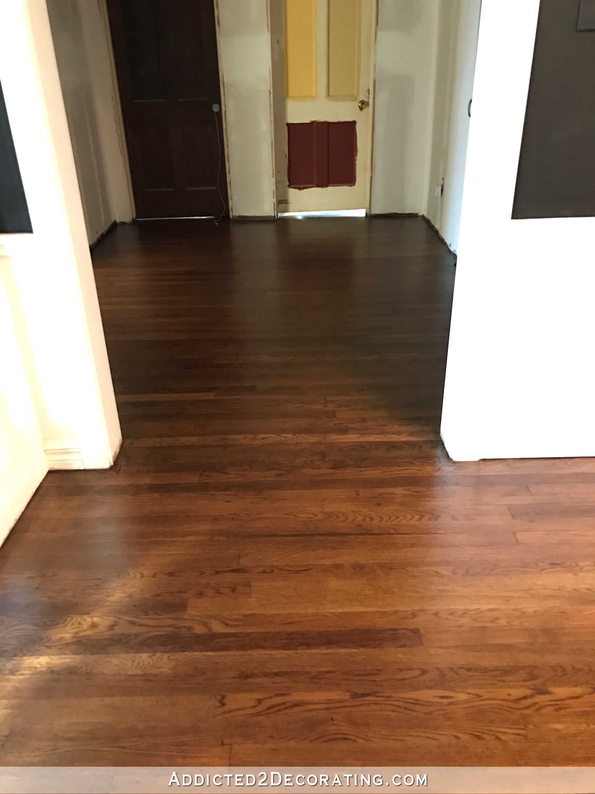 refinished red oak hardwood floors - hallway towards bedrooms