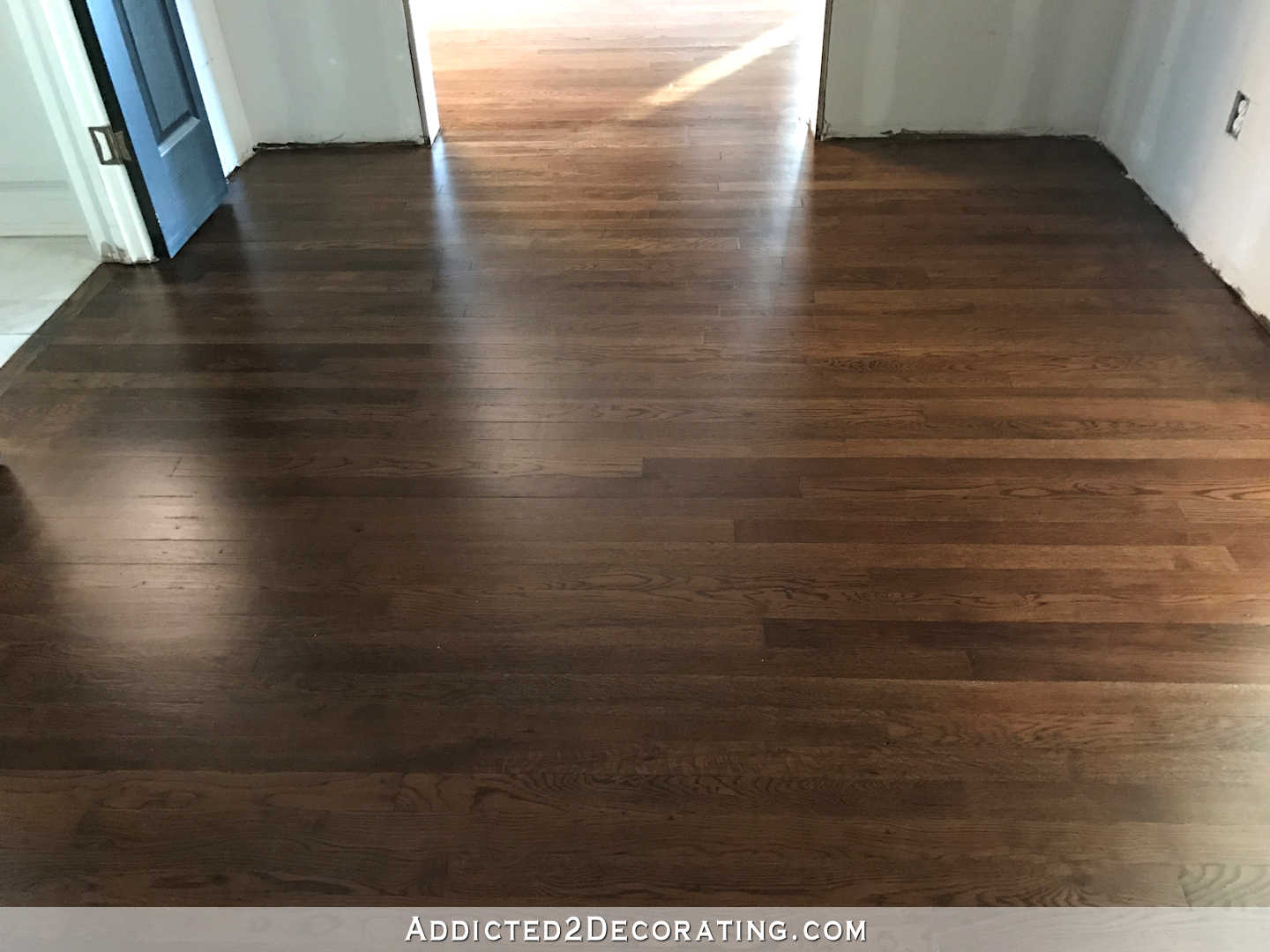 refinished red oak hardwood floors - hallway
