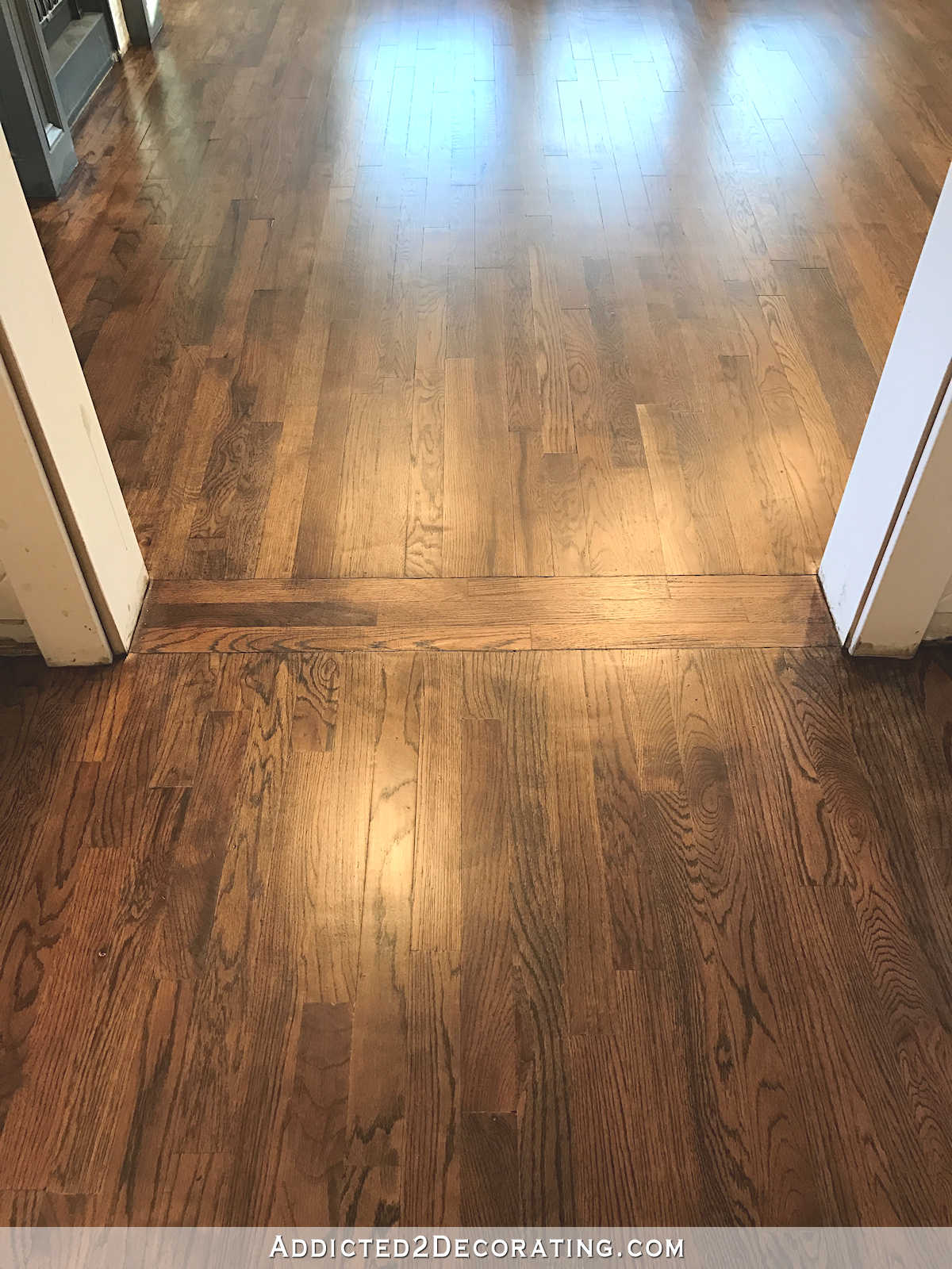 refinished red oak hardwood floors - kitchen and living room