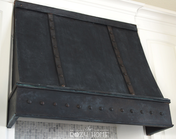 diy bronze range hood cover from The Rozy Home