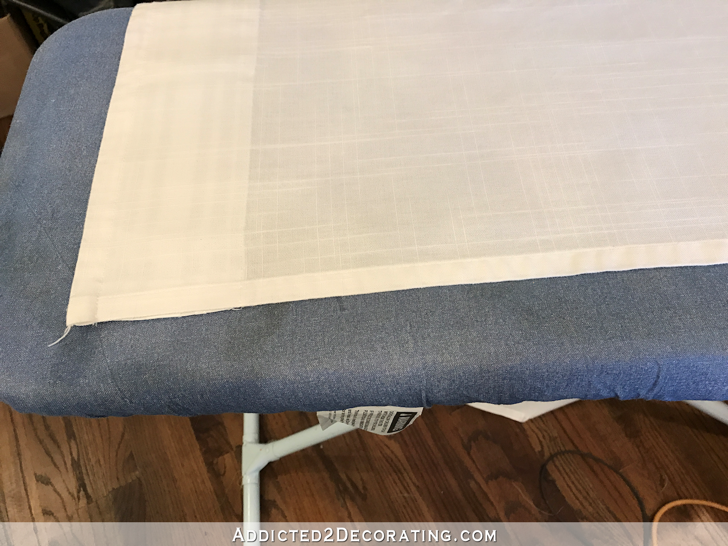 customize IKEA Ritva curtains with contras edge banding pom pom trim and pinch pleats - 7 - iron edge of Ritva curtain panel