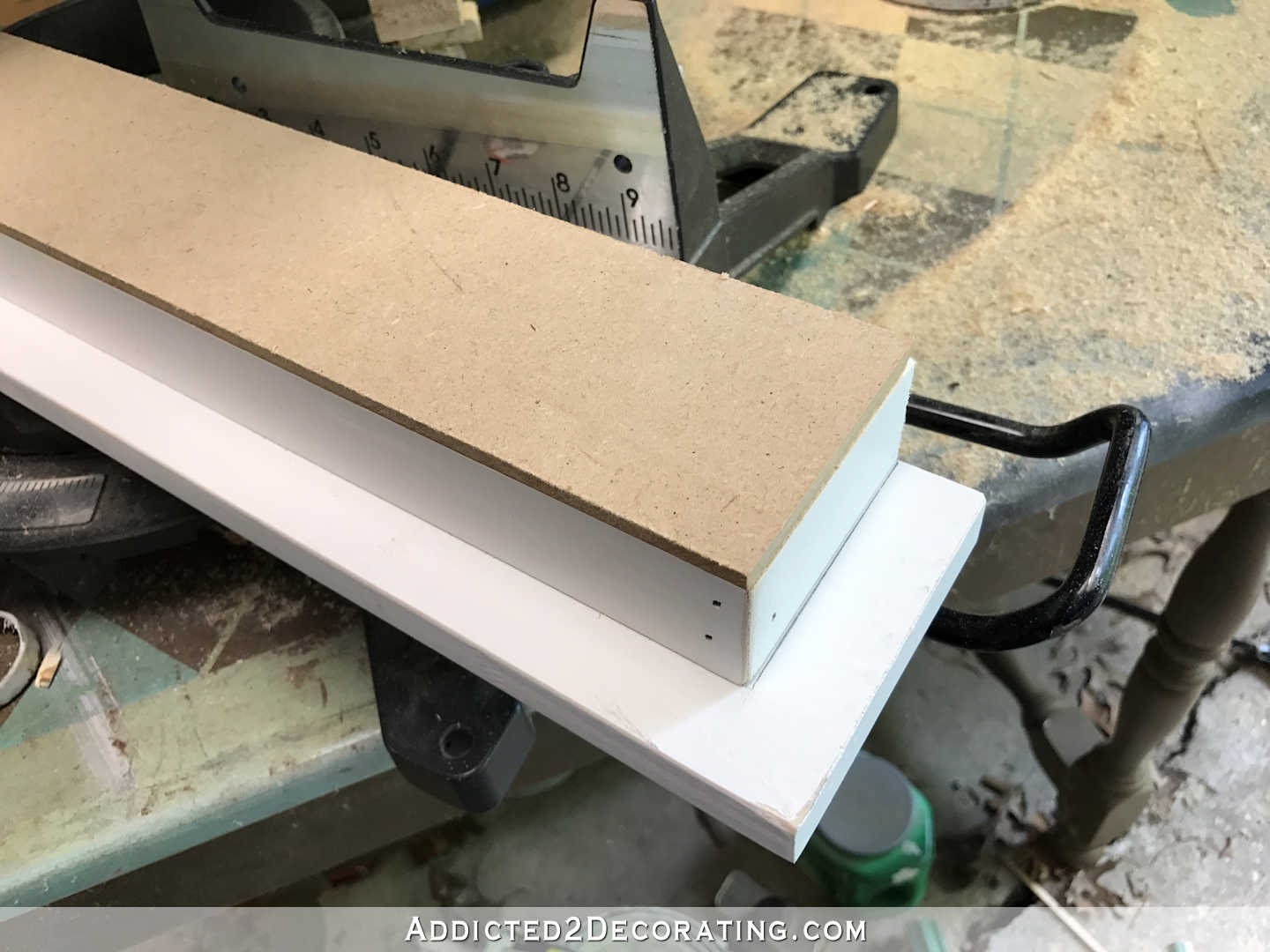 how to build a custom wood range hood cover - 19 - cut a piece of quarter inch MDF to cover the bottom