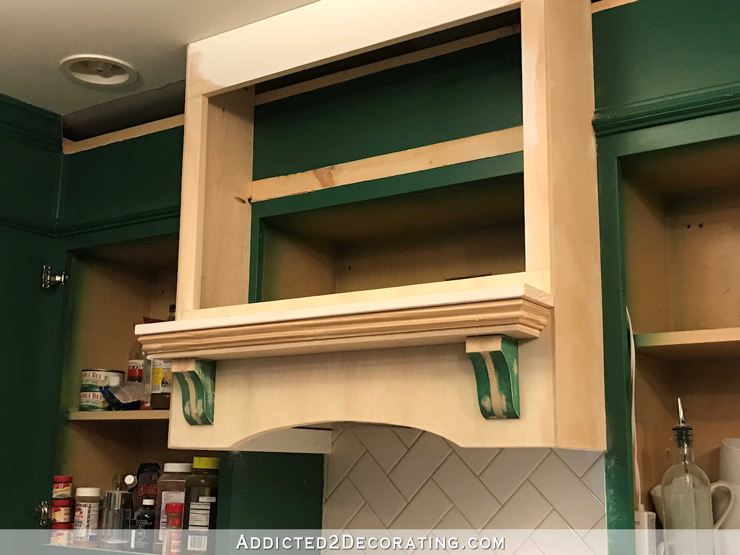 how to build a custom wood range hood cover - 28 - finished shelf on front of range hood cover