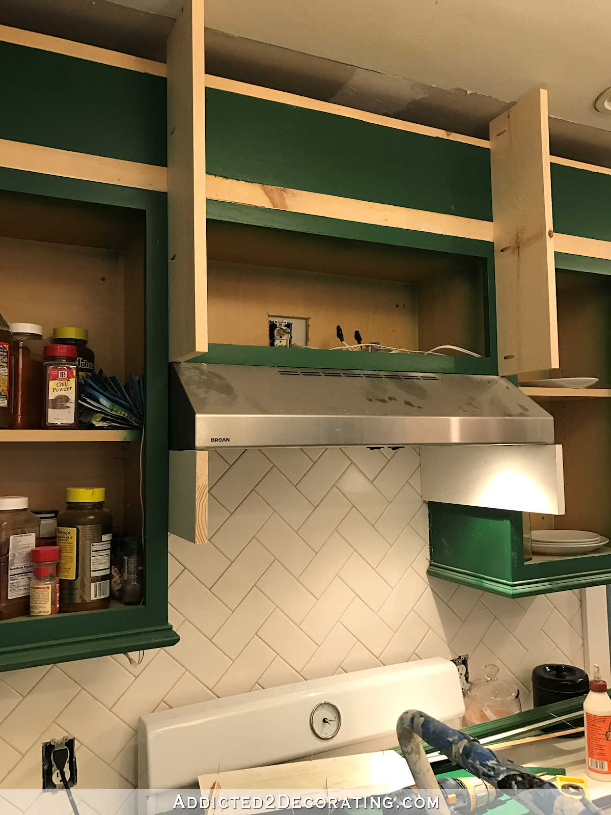 how to build a custom wood range hood cover - 8 - add side support pieces below range hood nailed into side cabinets