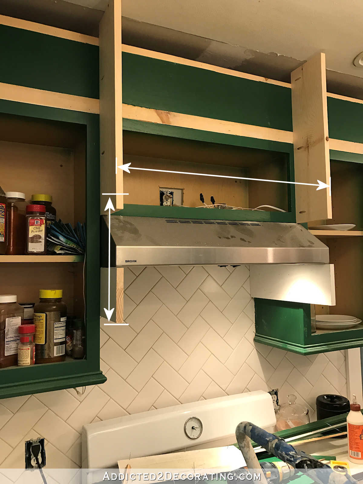 how to build a custom wood range hood cover - 8a - add side support pieces below range hood nailed into side cabinets