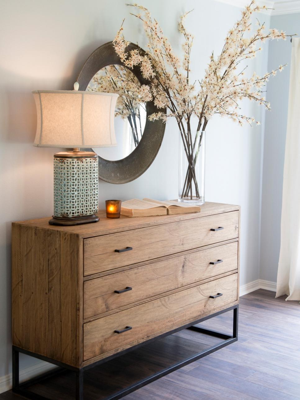 Fixer Upper living room after - natural wood dresser