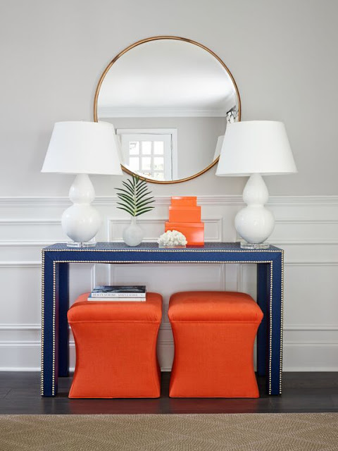 console with nailhead trim and two uphosltered ottomans beneath, via Stephanie Krauss Designs