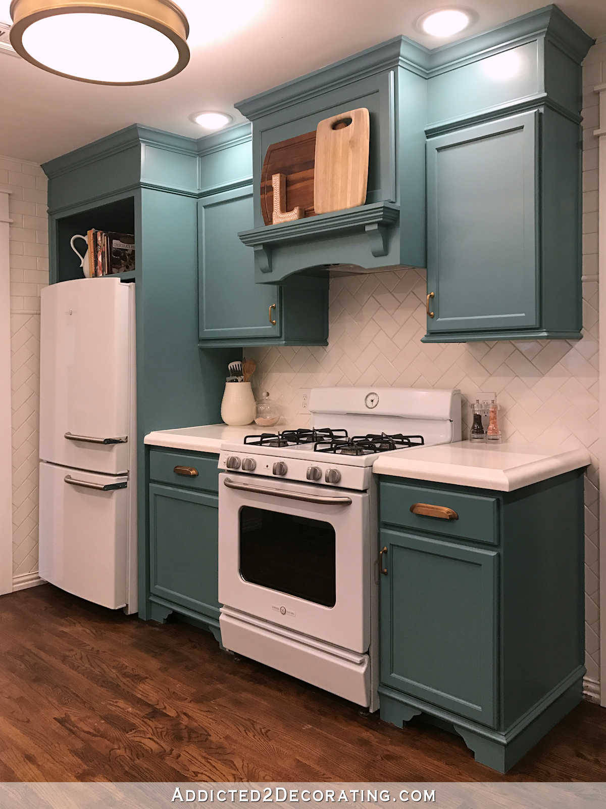 teal kitchen - range and refrgerator wall from back of kitchen