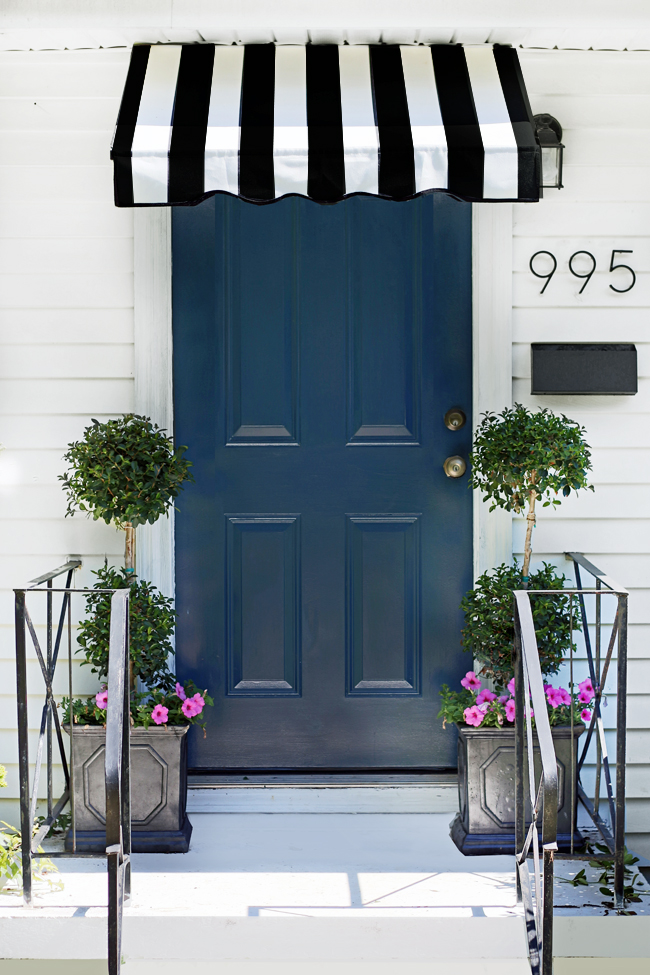 black and white stripe awning over door from Hunted Interior
