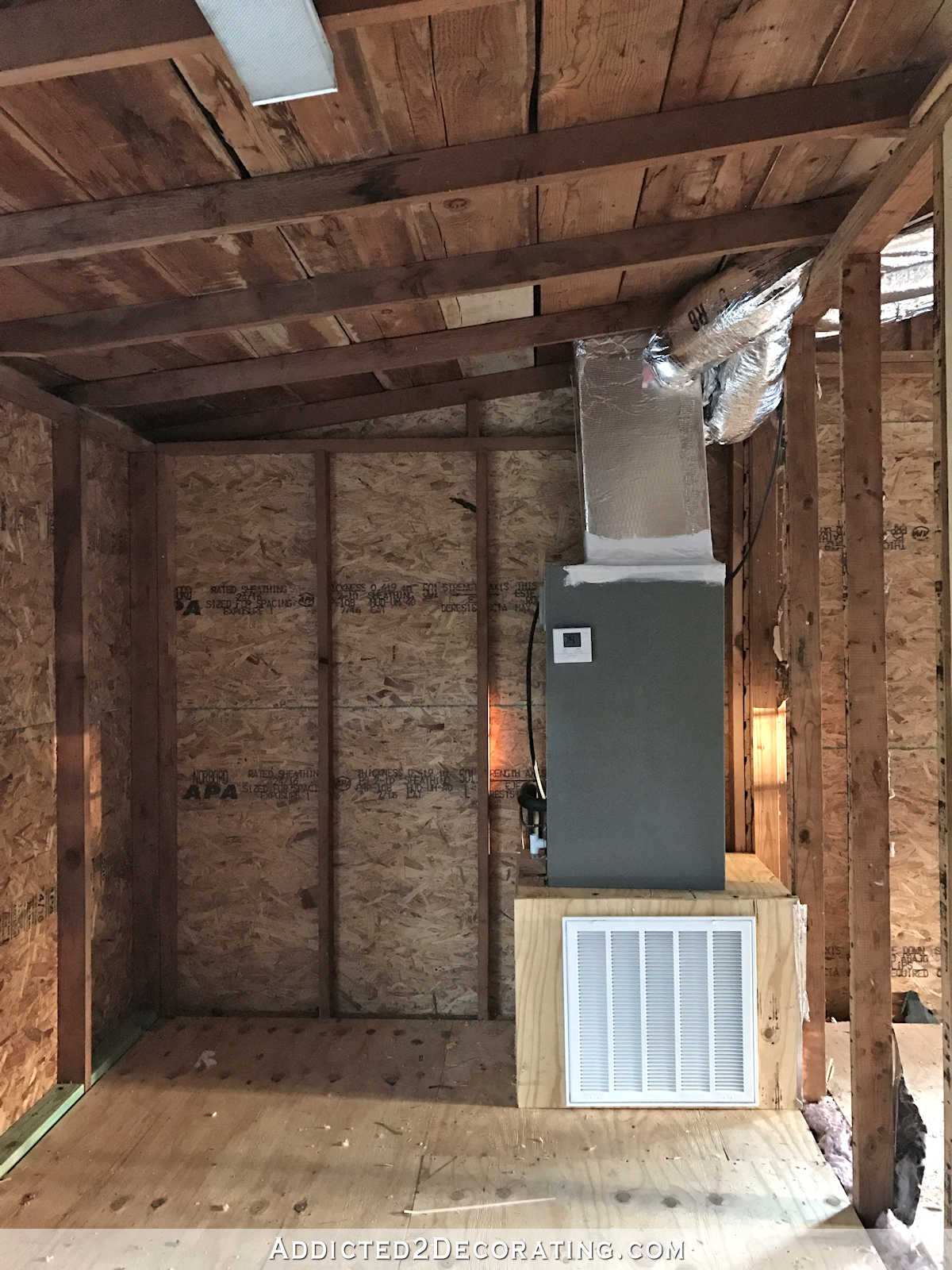 studio HVAC main system in corner of mudroom