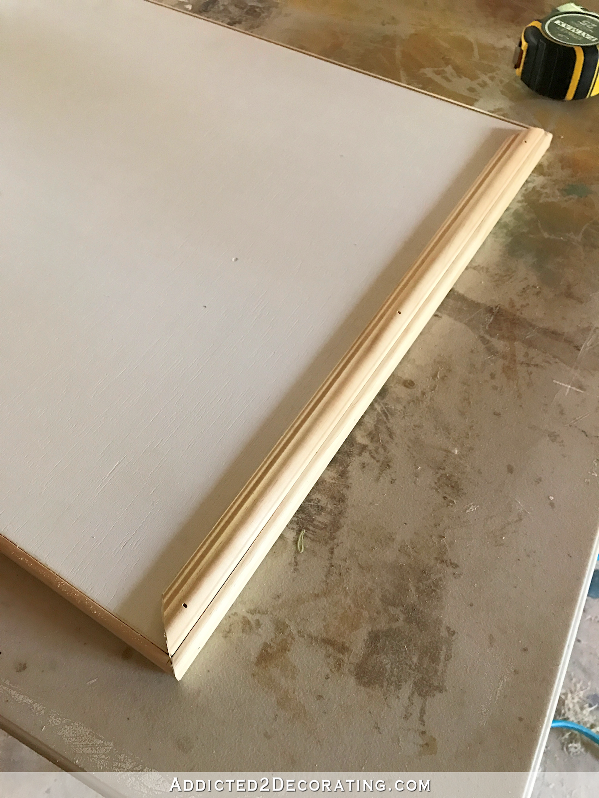 easy DIY cabinet doors - how to make cabinet doors with basic tools - 11 - attach cabinet moulding to the face of the door