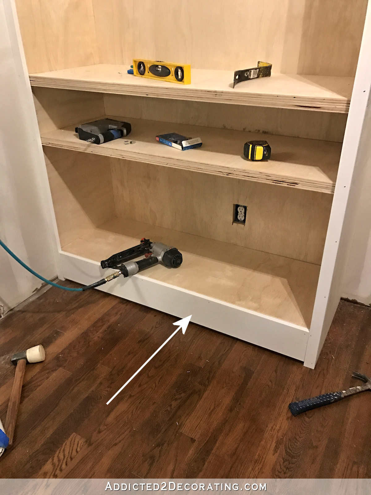 how to build cabinets- 17 - add trim to bottom of cabinet face
