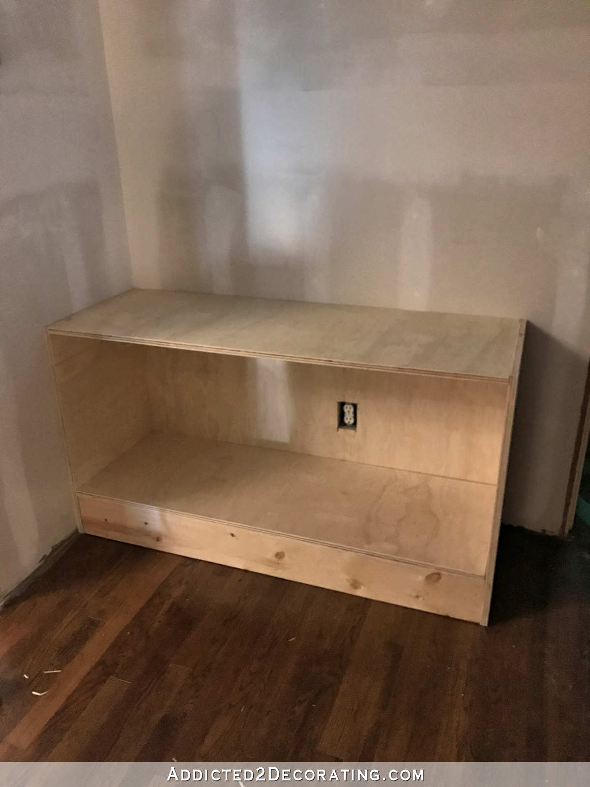 how to build cabinets- 7 - add plywood for bottom shelf