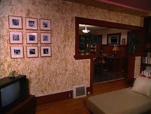 trading spaces - hay-glued-to-living-room-walls
