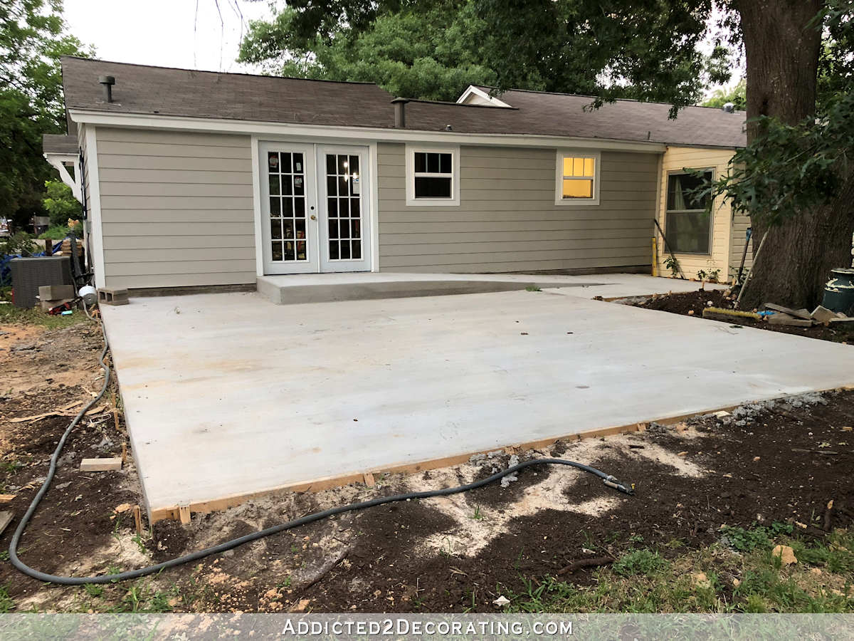 carport progress - large concrete pad for parking plus new wheelchair ramp for Matt