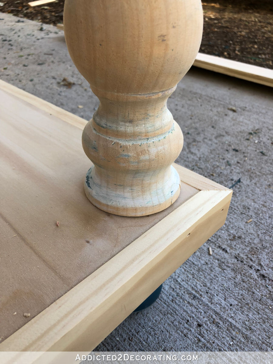 Add turned legs to the lower shelf section of the DIY console table