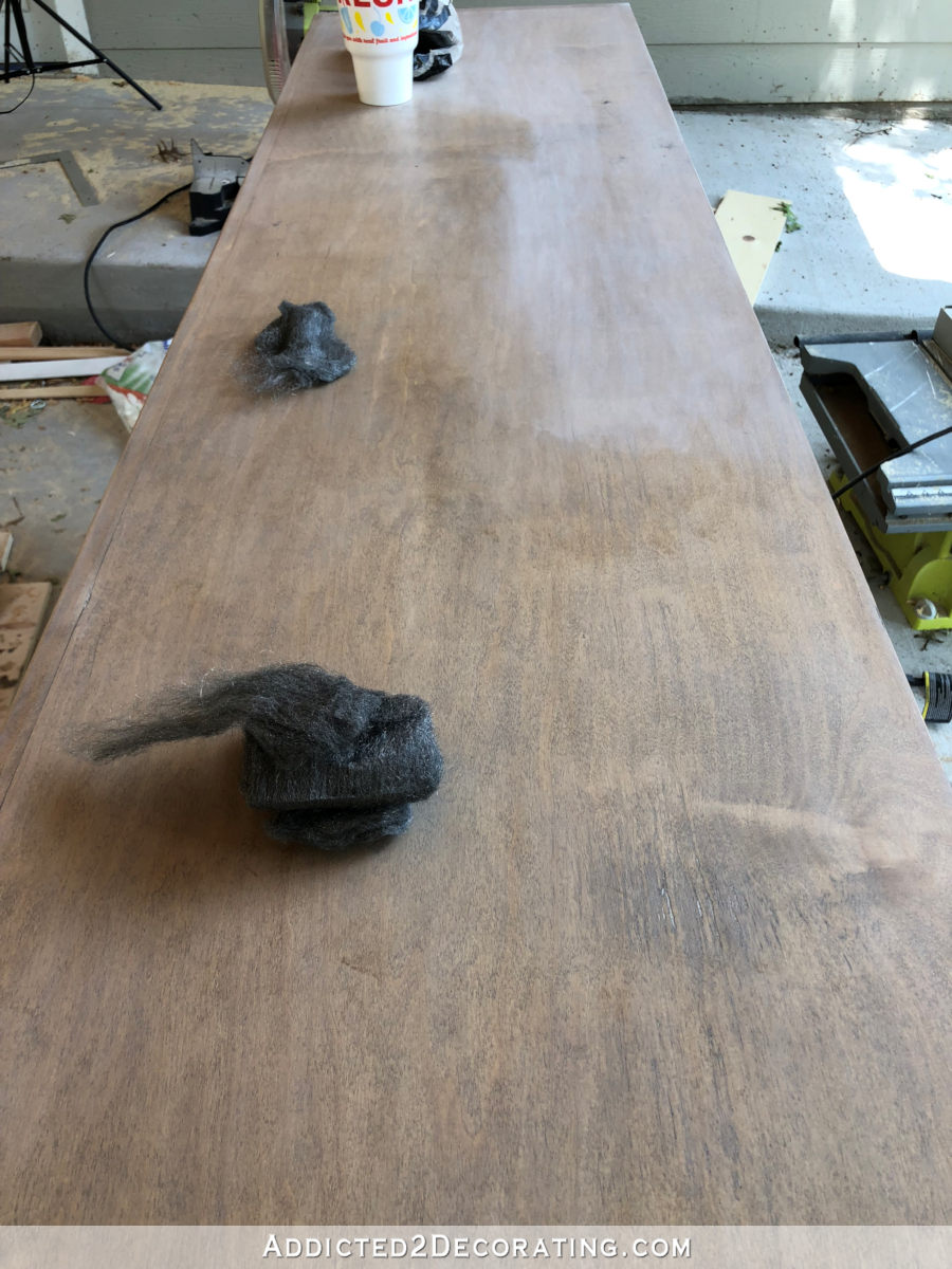 Comparison of stained wood with and without Briwax liming wax on top.