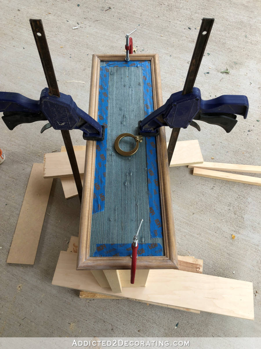 Gluing wood trim frame around grasscloth drawer front