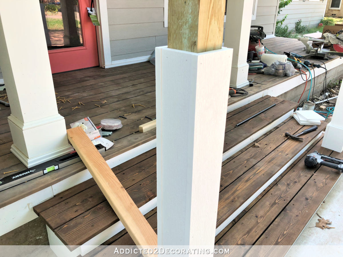 Covering the handrail post front and back sides with PVC boards ripped to post width plus side PVC boards..