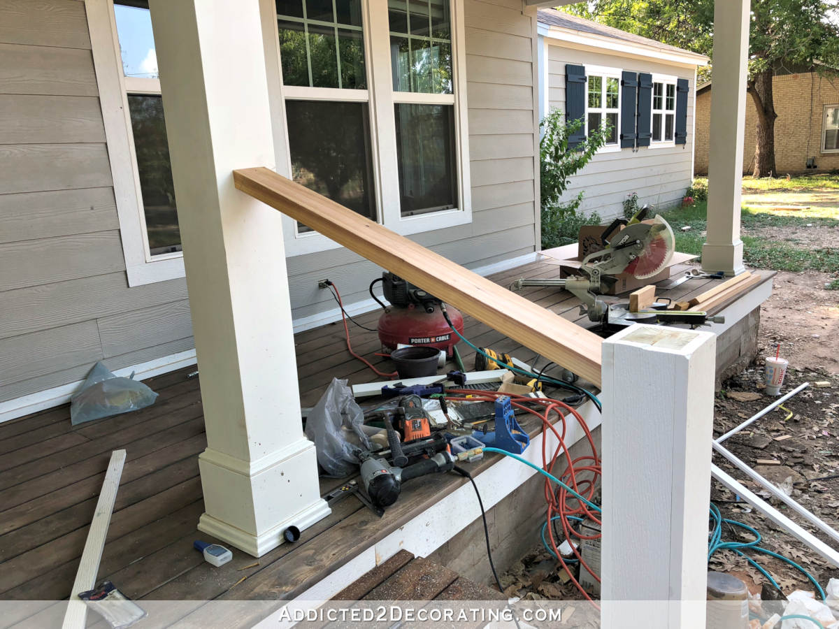 Attached top handrail for the porch step railing.