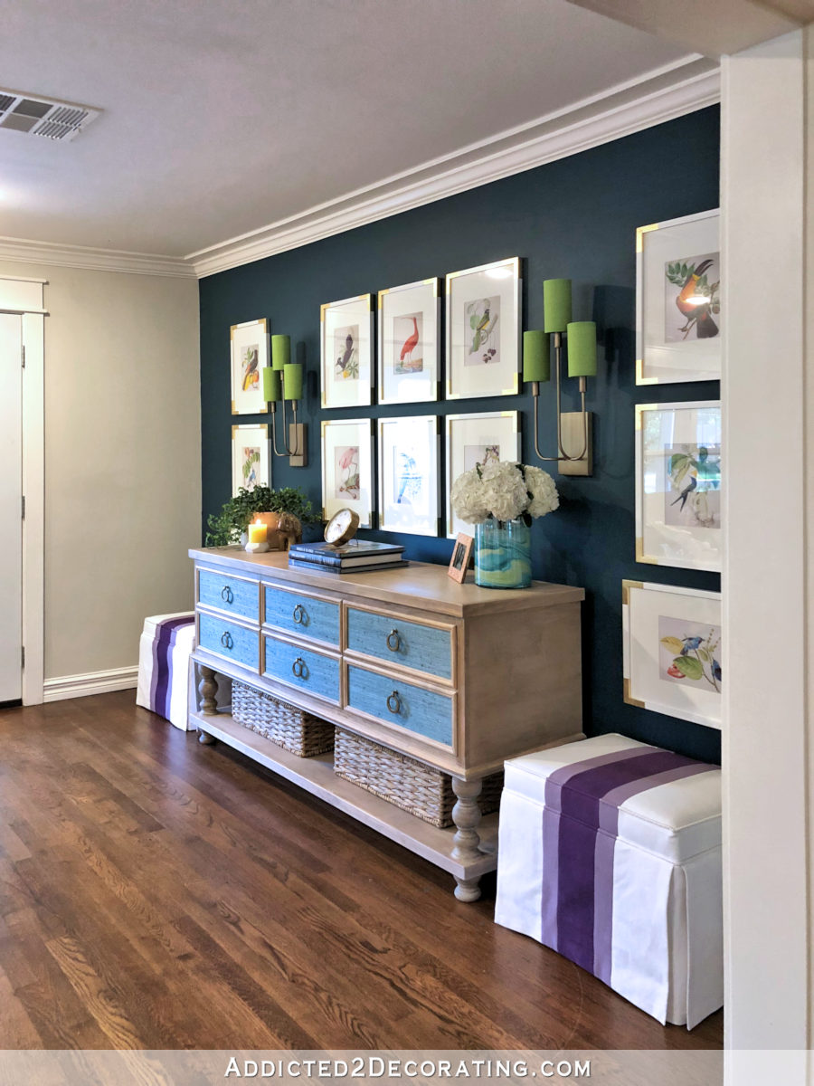 Entryway with gallery wall of bird illustrations and a DIY console table