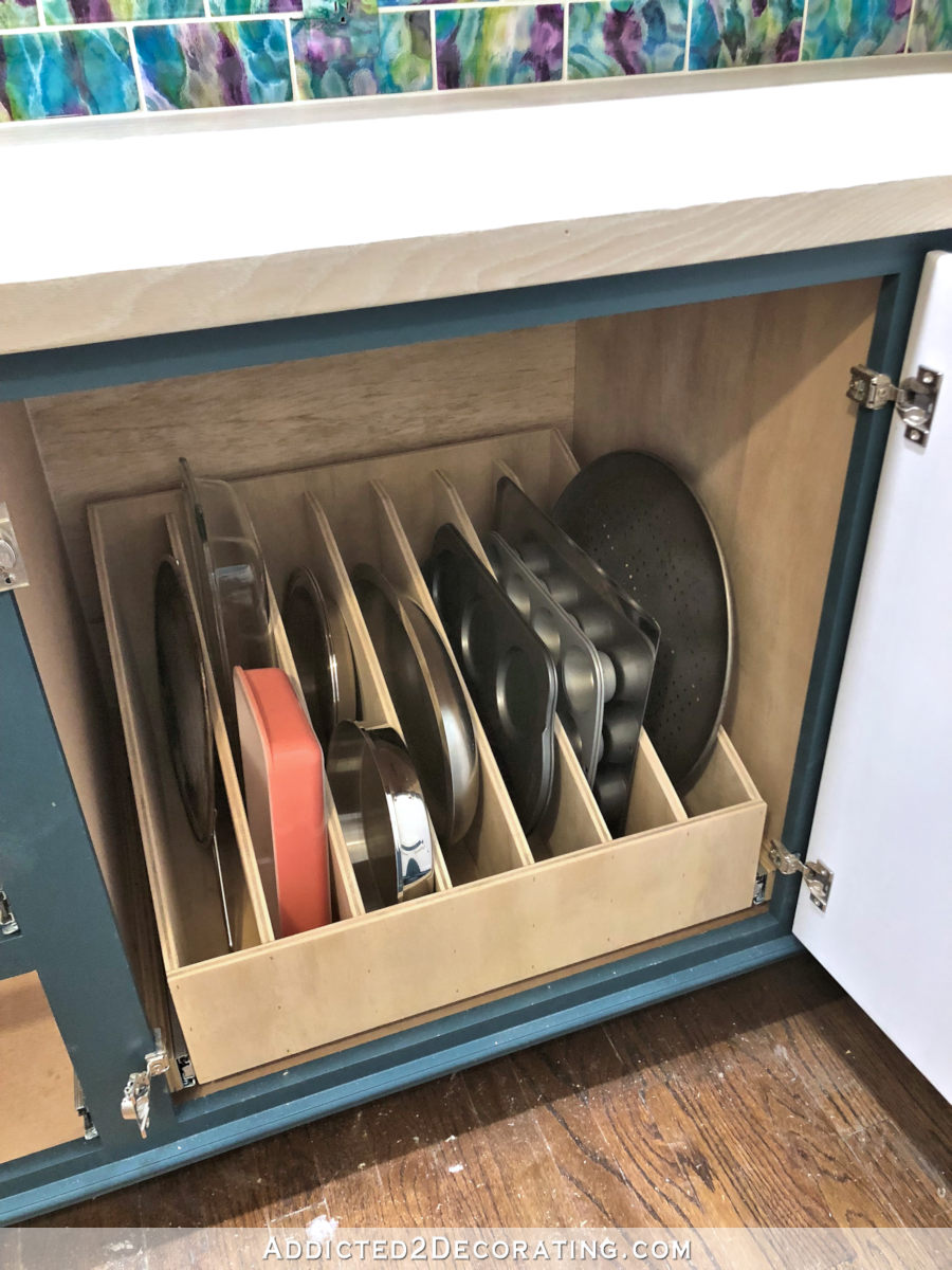DIY pull-out slotted storage drawer for cookie sheets