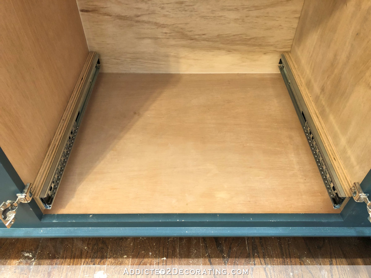 DIY pull-out vertical storage drawer - install drawer slides in cabinet before buidling drawer
