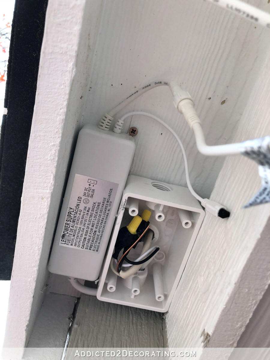 installing LED tape lights around front porch roof - intall transformer next to junction box and make connections