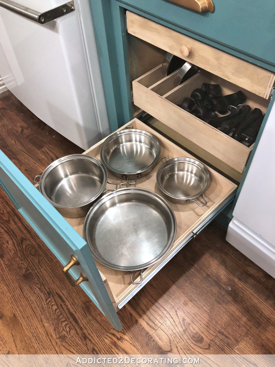 how to build organized and customized DIY pull out shelf for cookware - lower shelf with four most-used pots and pans