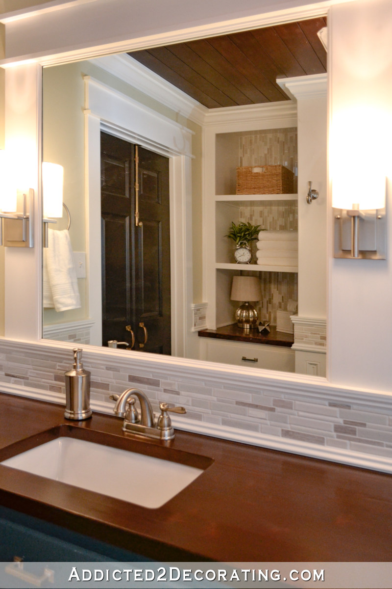 Bathroom remodel - tile accent backsplash, built in open shelves, DIY wood countertop with undermount sink