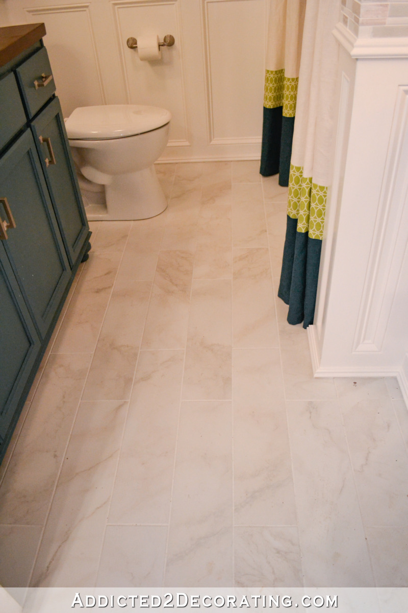 New ceramic tile flooring that looks like marble in the bathroom
