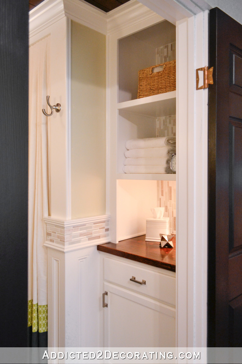 Built-in open shelves in bathroom