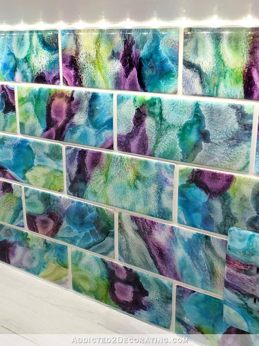 close up of custom resin and alcohol ink backsplash tiles in butlers pantry design