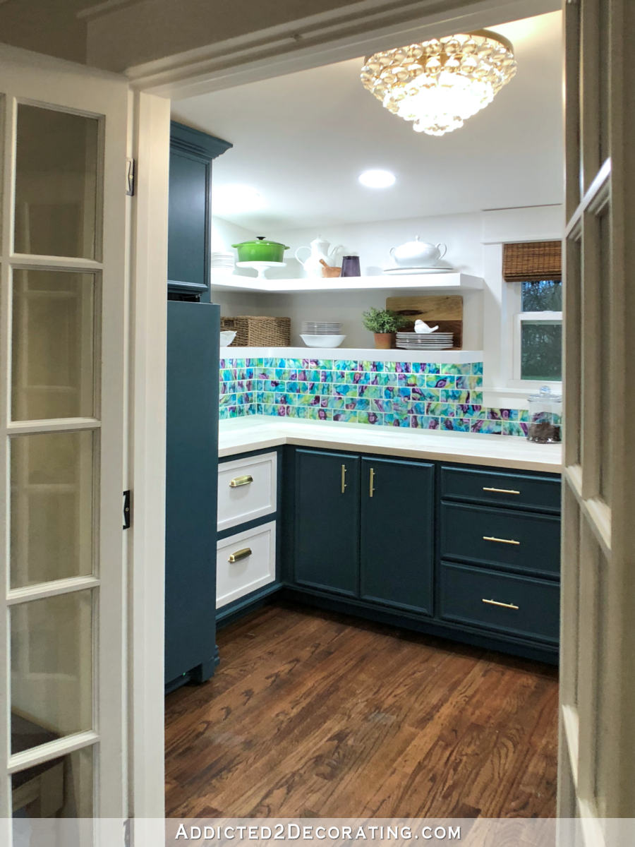butlers pantry remodel with dark teal cabinets, whitewashed red oak countertop, and bright turquoise and green tile backsplash