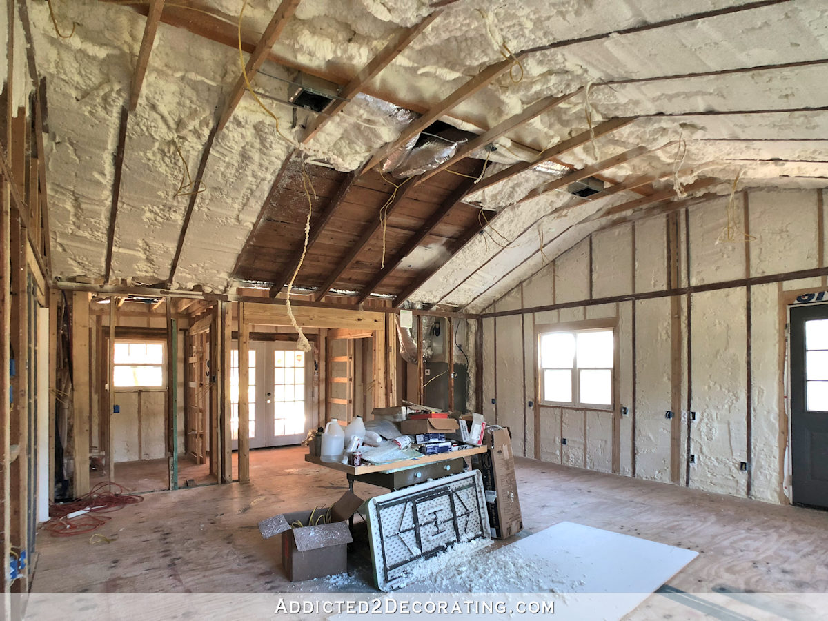 back area of studio - half bathroom- closet with spray foam insulation in walls and ceiling